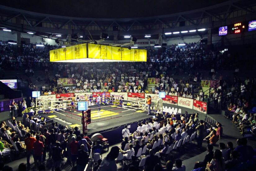 Muay Thai fans gather to watch a match.